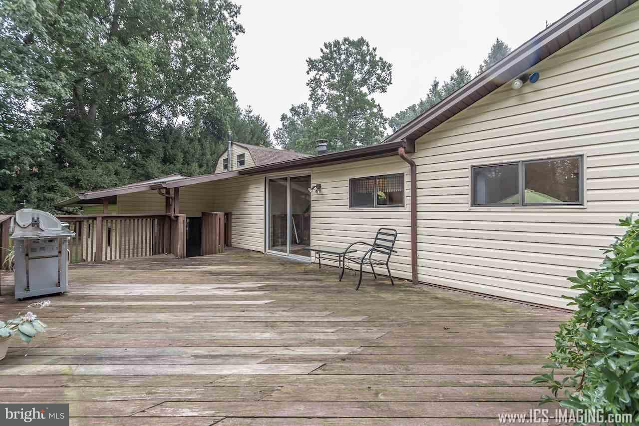 2105 Copenhaffer Road Dover, PA 17315 - Photo 33 of 36 a backyard of a house with table and chairs