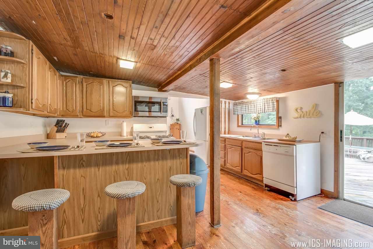 2105 Copenhaffer Road Dover, PA 17315 - Photo 6 of 36 a kitchen with a sink cabinets and window
