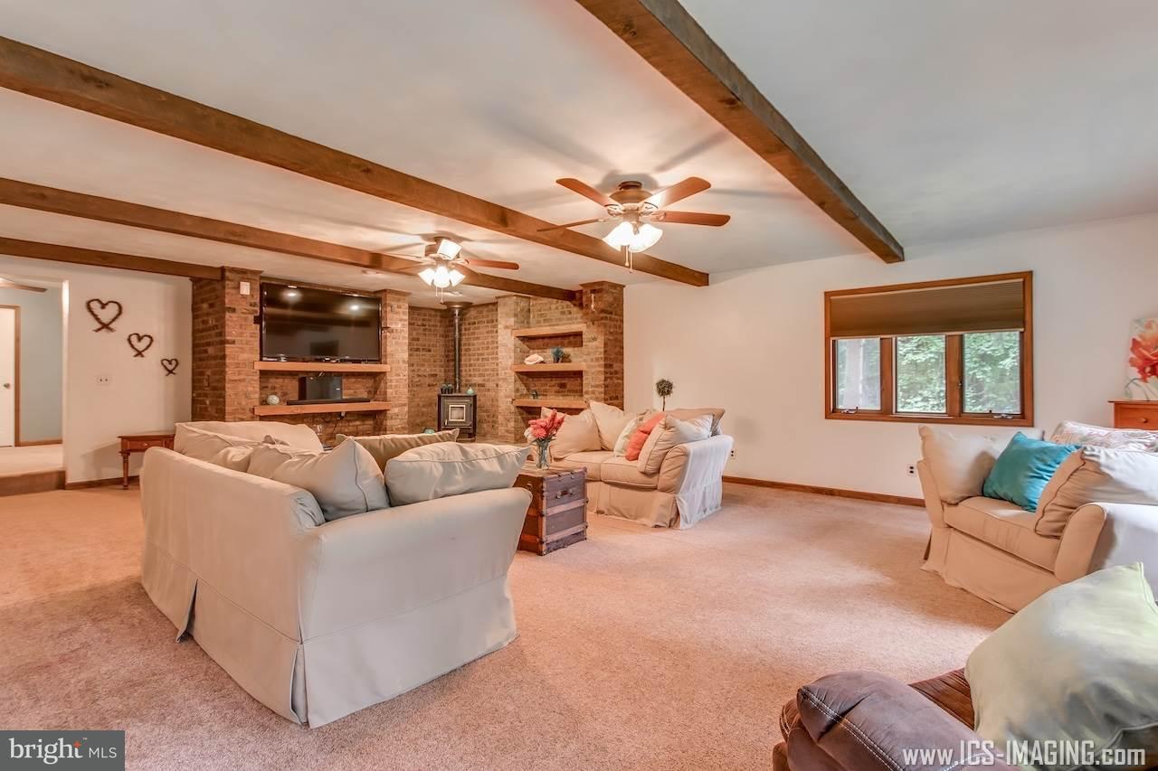 2105 Copenhaffer Road Dover, PA 17315 - Photo 7 of 36 a living room with furniture and a large window