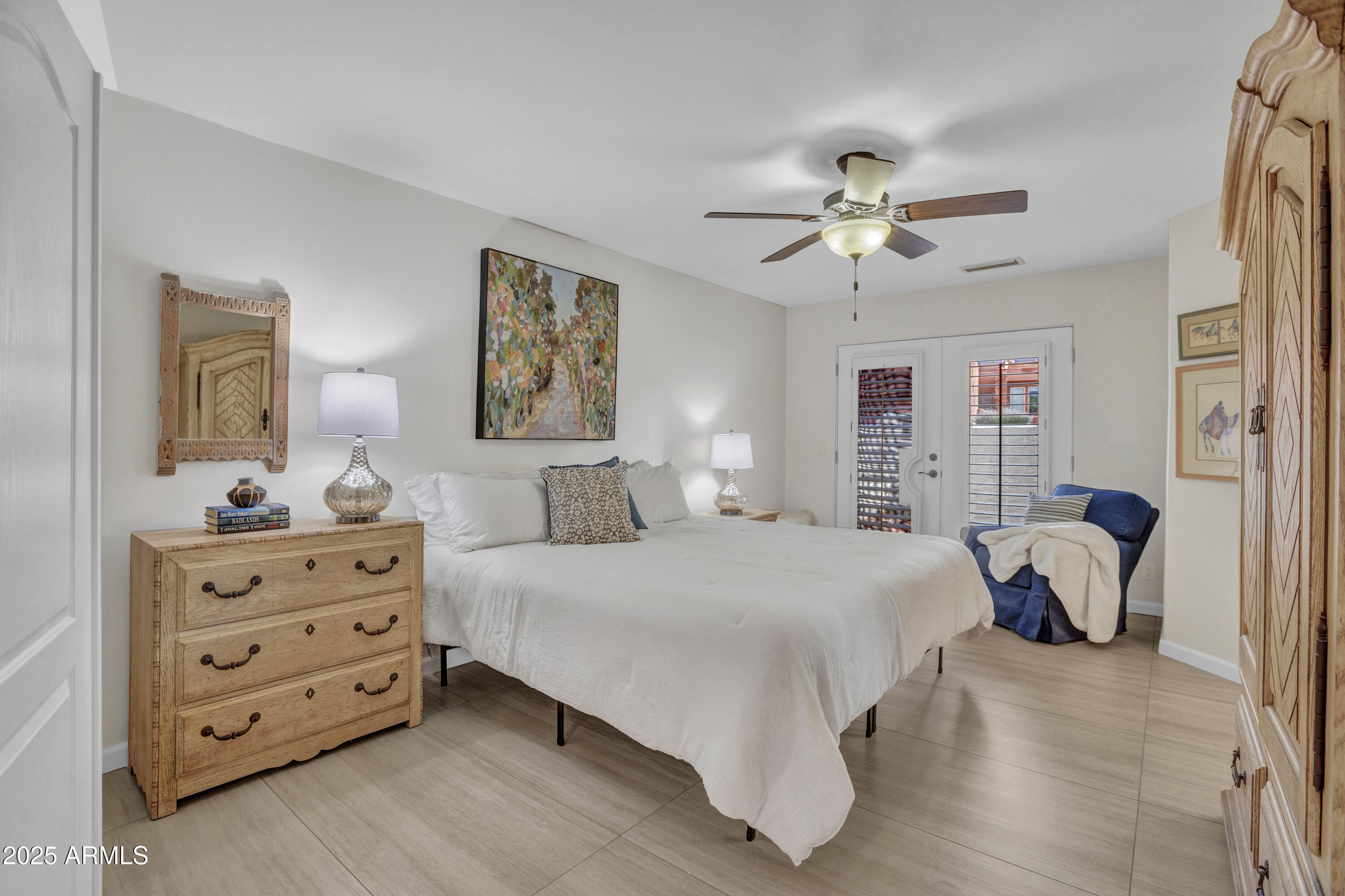 375 Indian Cliffs Road Sedona, AZ 86336 - Photo 12 of 28 a bedroom with bed and window