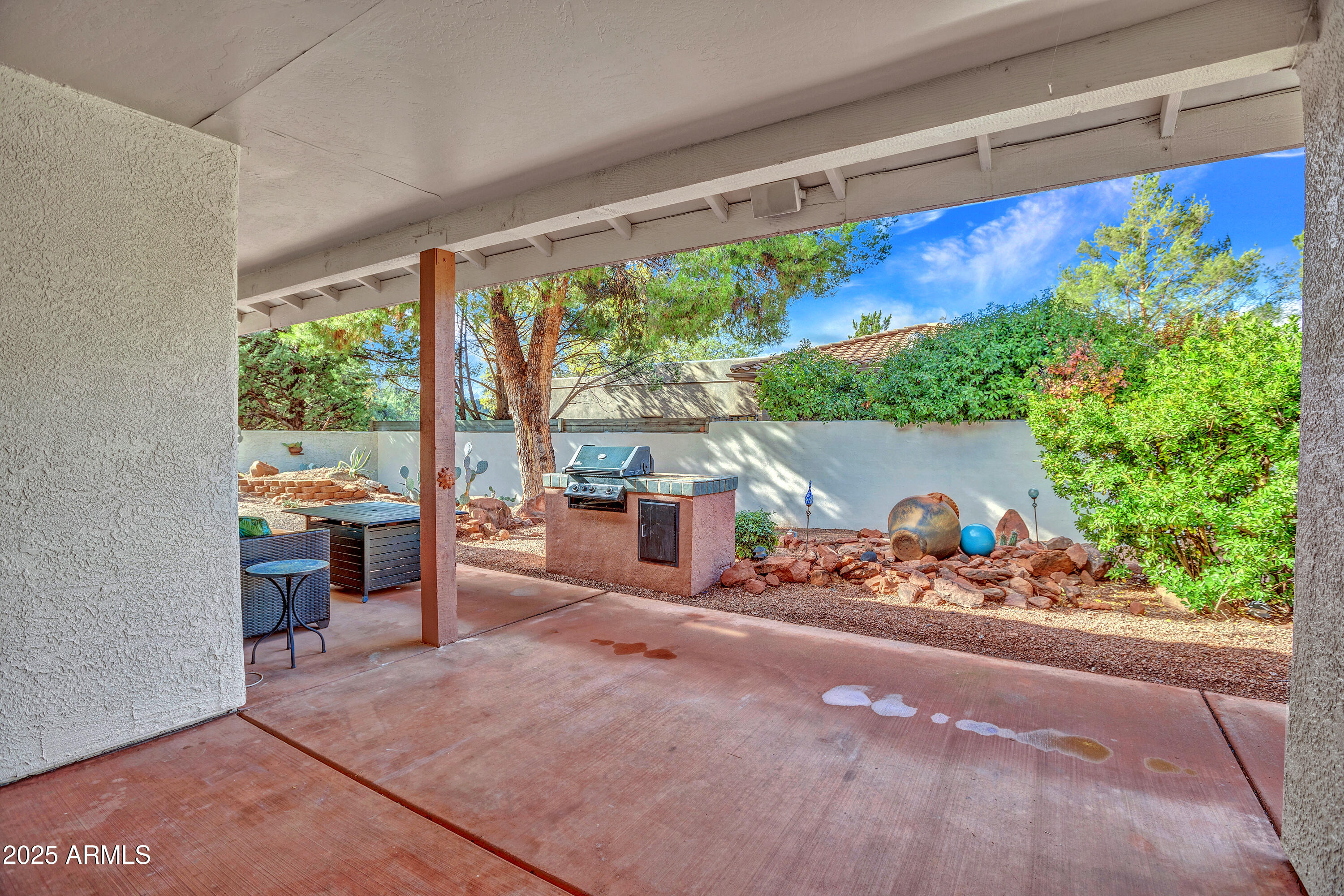375 Indian Cliffs Road Sedona, AZ 86336 - Photo 21 of 28 a outdoor living space with furniture and garden view