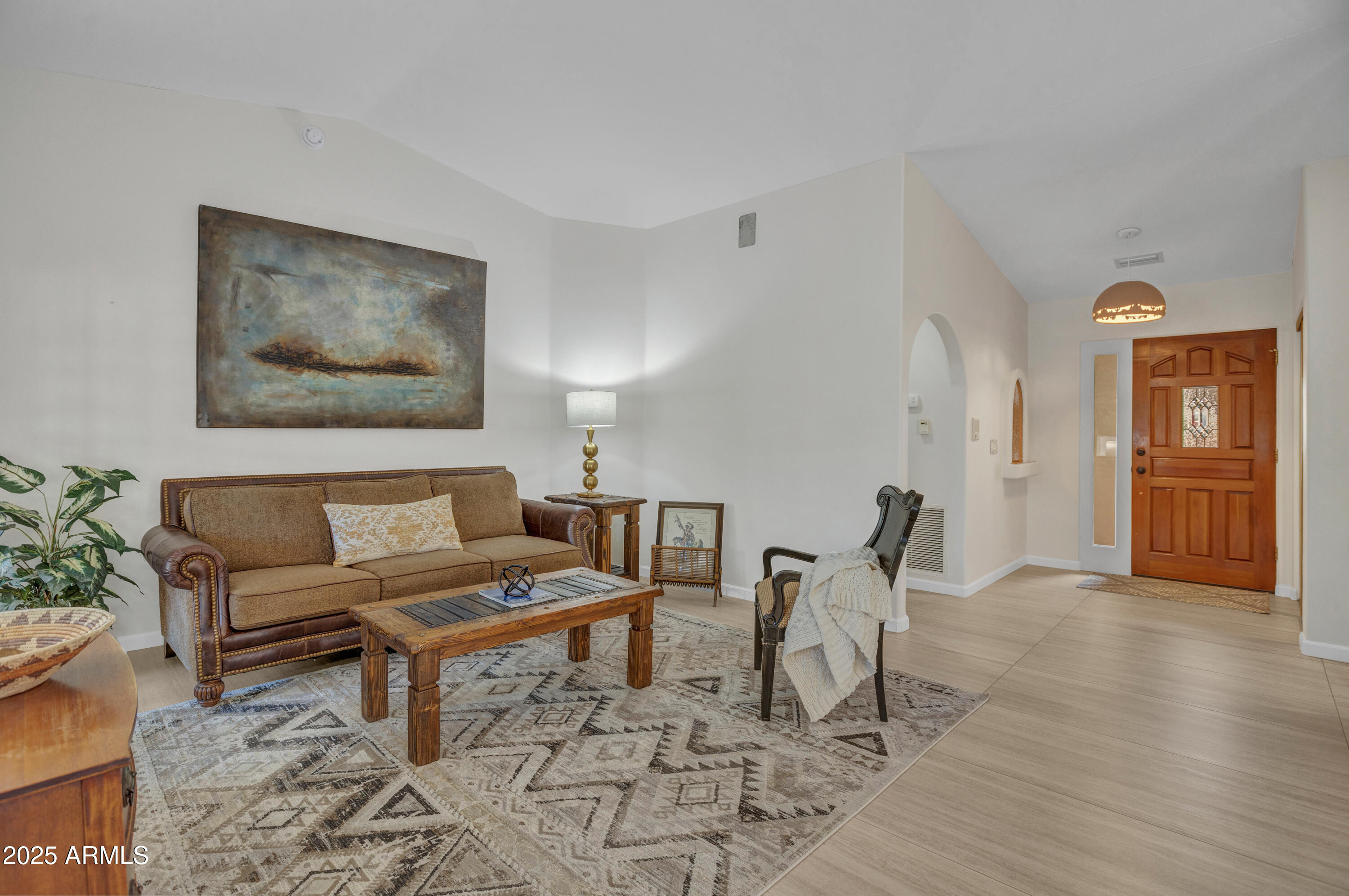 375 Indian Cliffs Road Sedona, AZ 86336 - Photo 7 of 28 a living room with furniture and wooden floor