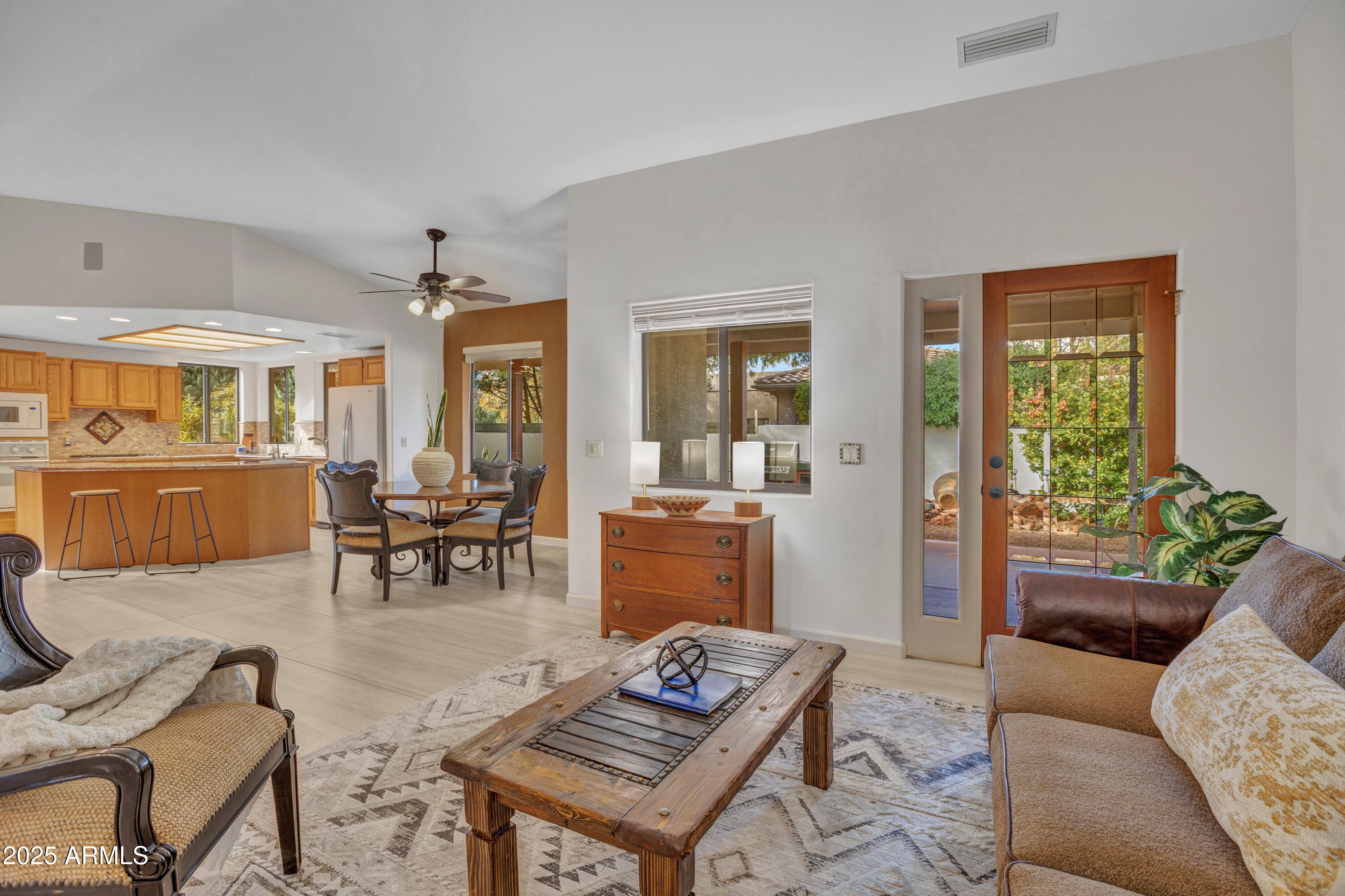 375 Indian Cliffs Road Sedona, AZ 86336 - Photo 8 of 28 a living room with furniture and a table