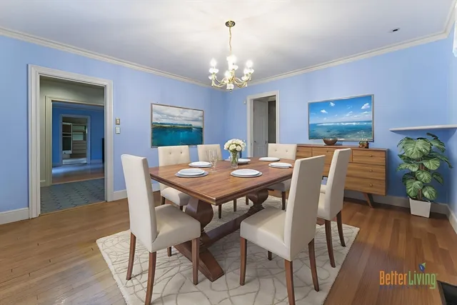a kitchen with a sink window and cabinets