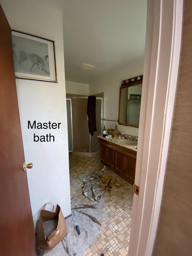 811 Fifteenth Avenue Menlo Park, CA 94025 - Photo 17 of 18 a living room with a couch and a stove next to a window