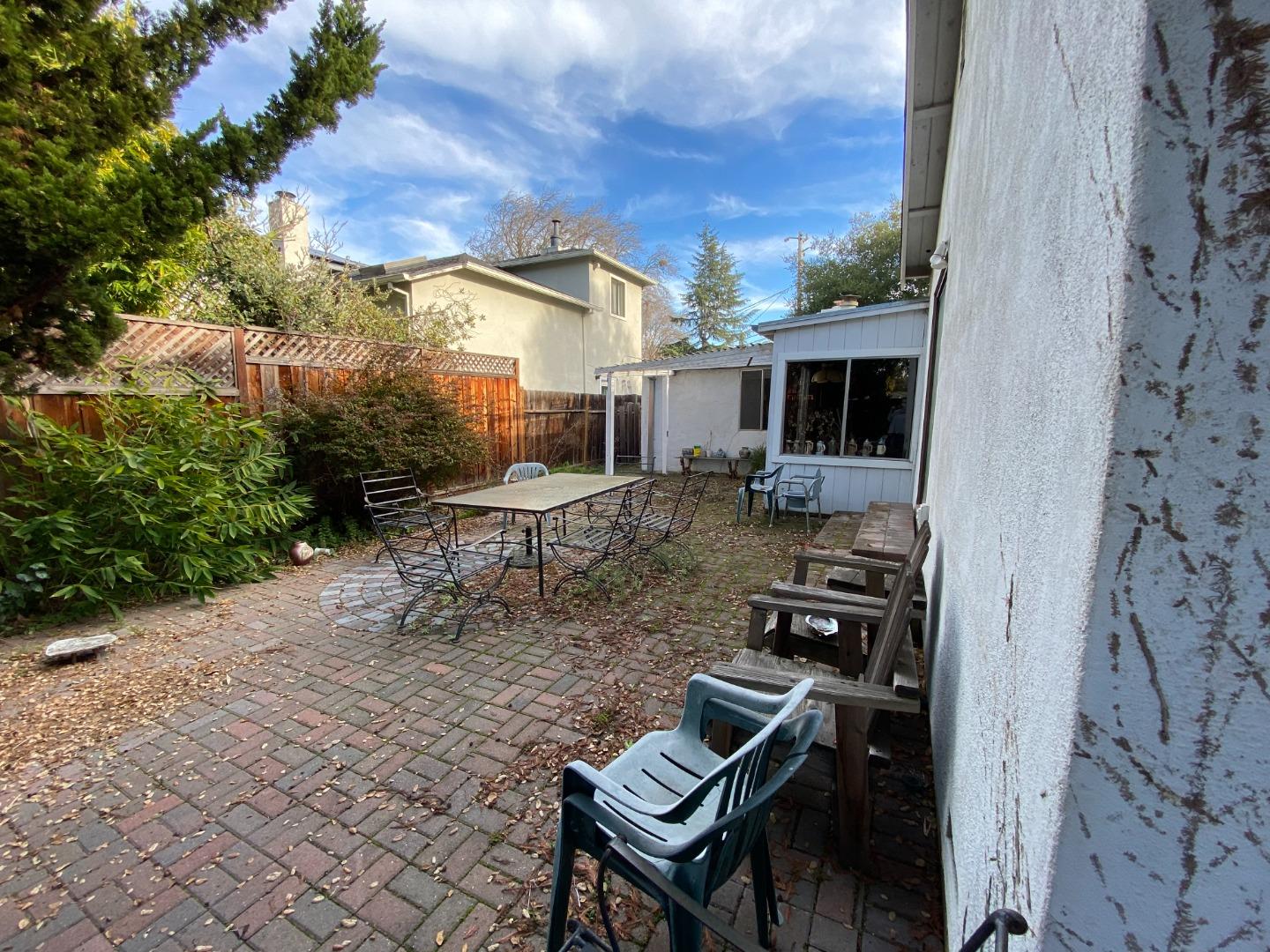 811 Fifteenth Avenue Menlo Park, CA 94025 - Photo 6 of 18 a backyard of a house with seating space