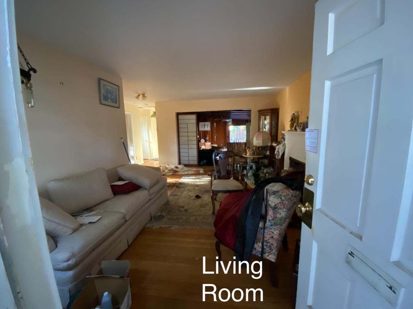 811 Fifteenth Avenue Menlo Park, CA 94025 - Photo 8 of 18 a living room with furniture and a mirror