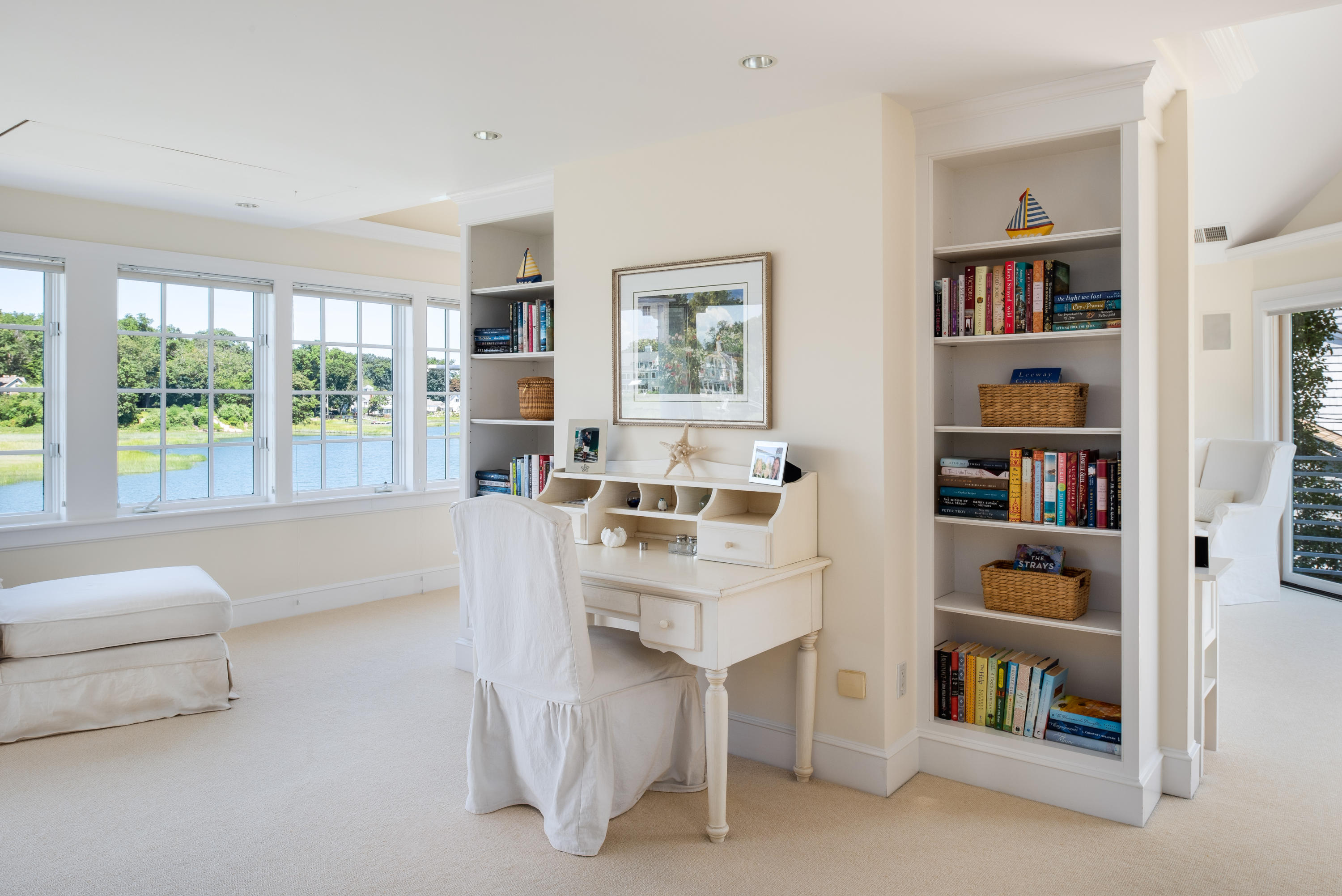 18 Pine Point Road Rowayton, CT 06853 - Photo 11 of 37 a living room with furniture and a book shelf