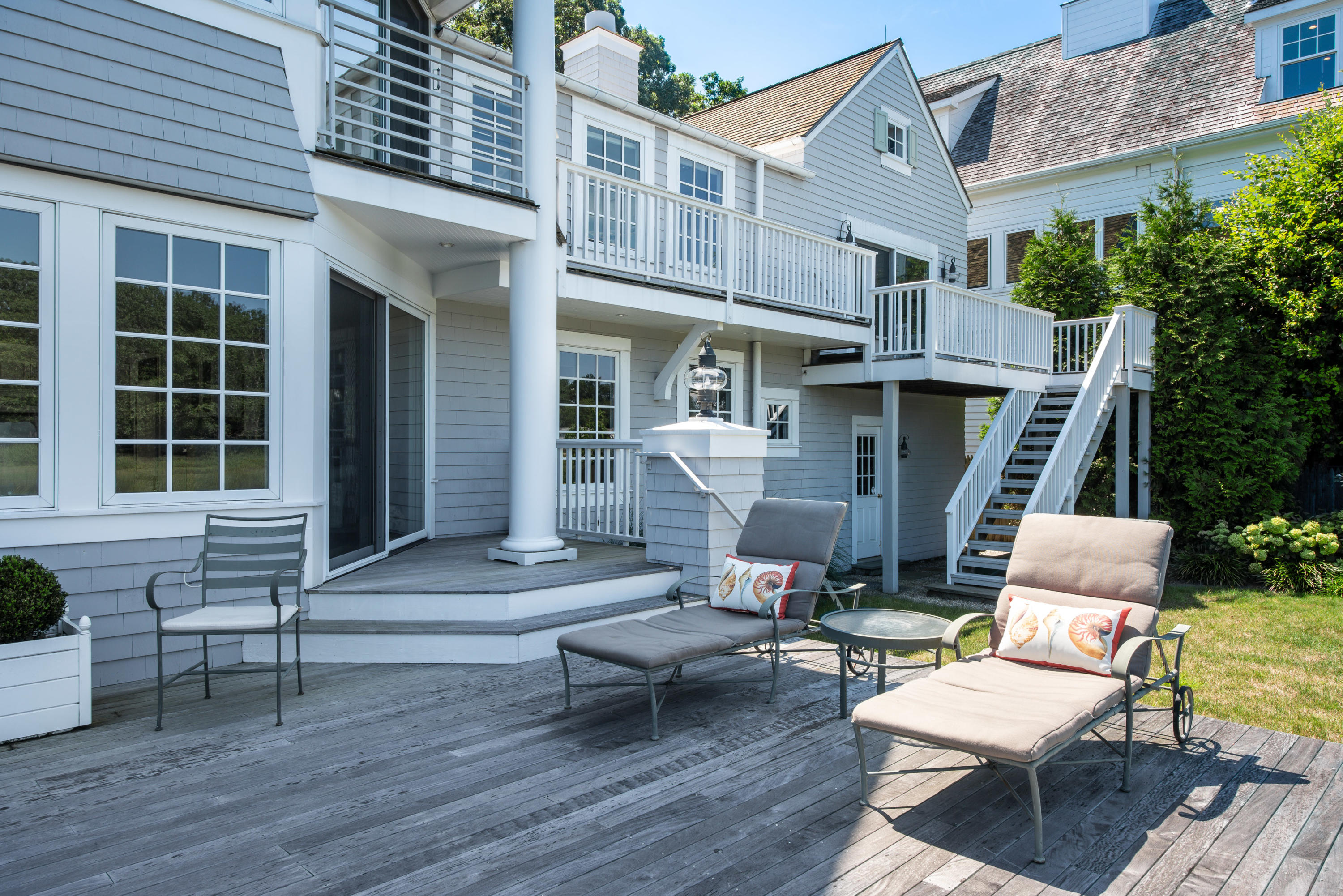 18 Pine Point Road Rowayton, CT 06853 - Photo 19 of 37 a outdoor space with patio the couches and a dining table with chairs