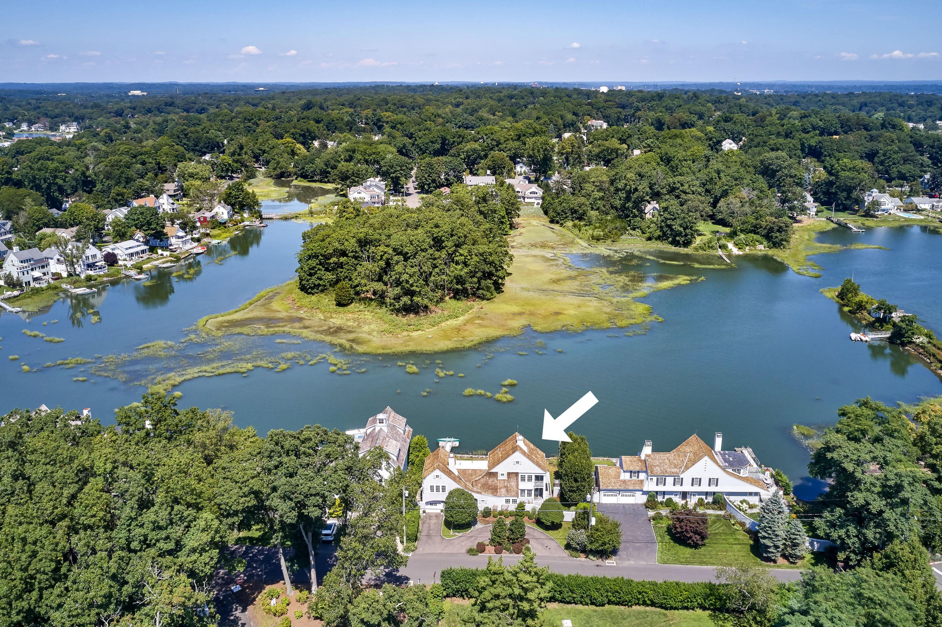 18 Pine Point Road Rowayton, CT 06853 - Photo 32 of 37 a view of a lake with a mountain