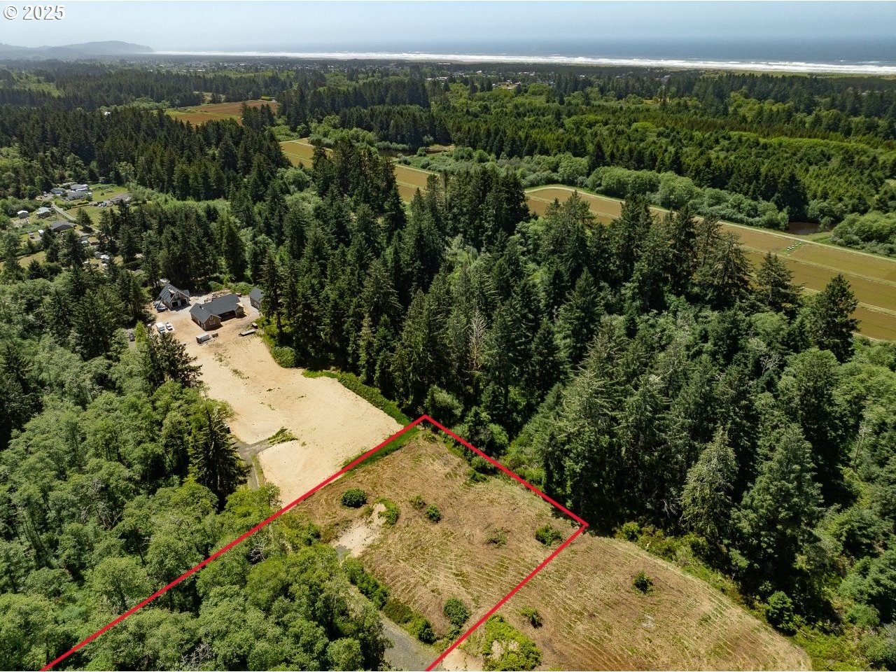 10501 Pearl Lane Long Beach, WA 98631 - Photo 6 of 9 an aerial view of a house with a yard
