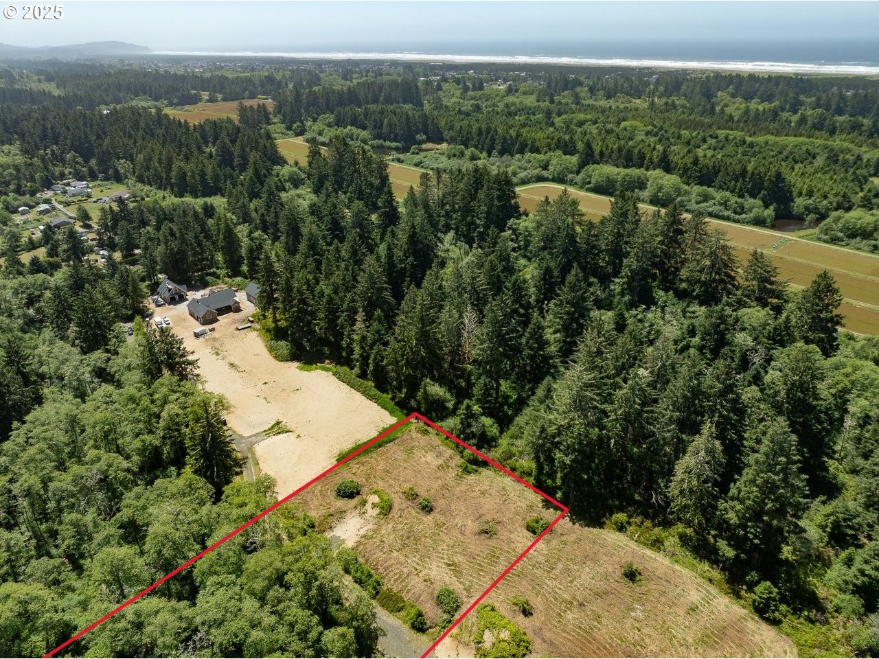 10501 Pearl Lane Long Beach, WA 98631 - Photo 7 of 9 an aerial view of a forest with houses