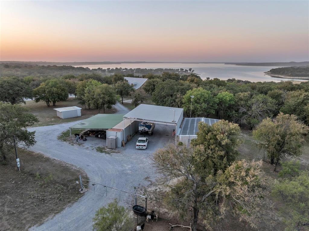 139 Pr-1537 Road Bridgeport, TX 76426 - Photo 15 of 40 an aerial view of a garden with plants and large trees