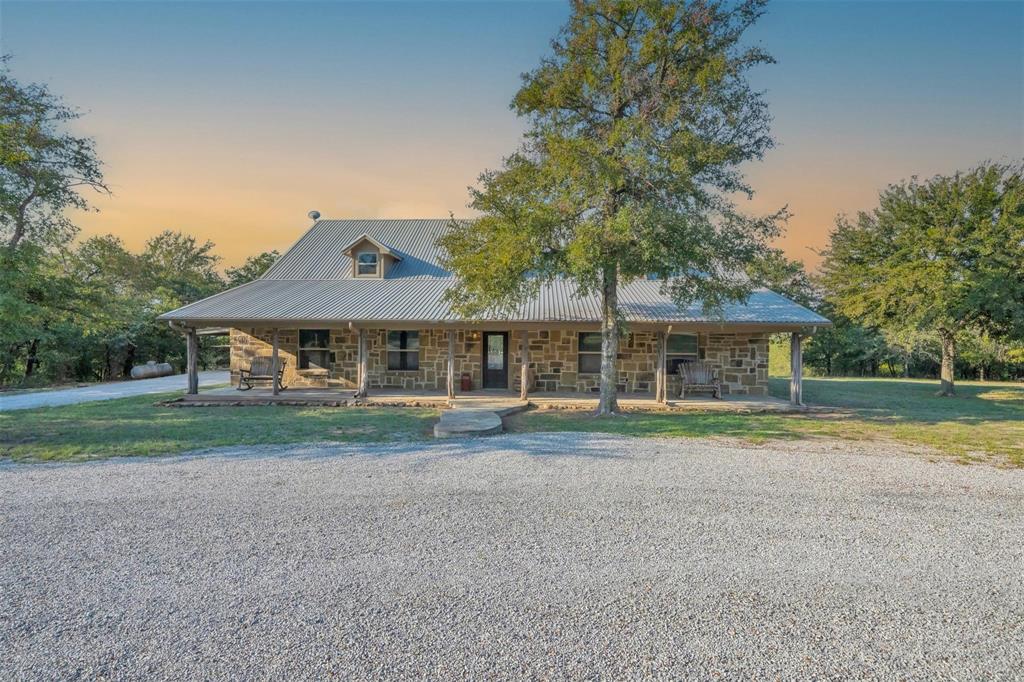 139 Pr-1537 Road Bridgeport, TX 76426 - Photo 17 of 40 a front view of house with yard and trees