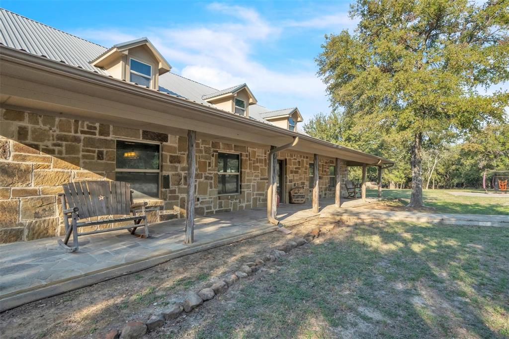 139 Pr-1537 Road Bridgeport, TX 76426 - Photo 20 of 40 a view of a house with backyard porch and sitting area