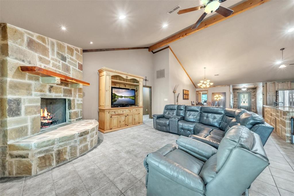 139 Pr-1537 Road Bridgeport, TX 76426 - Photo 28 of 40 a living room with furniture and a flat screen tv
