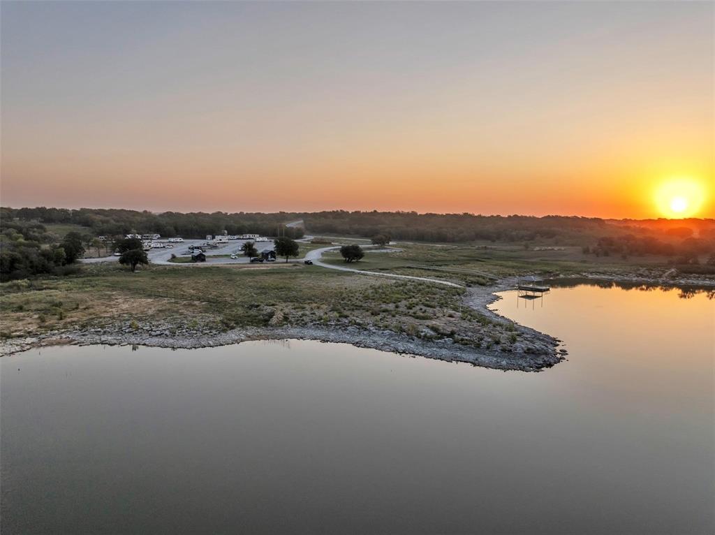 139 Pr-1537 Road Bridgeport, TX 76426 - Photo 3 of 40 a view of a lake with a mountain in the background