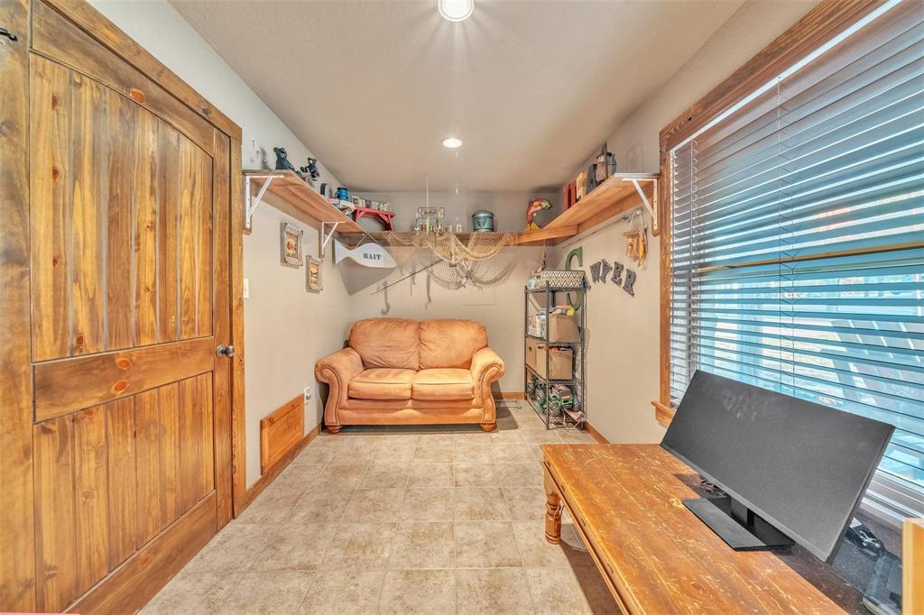139 Pr-1537 Road Bridgeport, TX 76426 - Photo 34 of 40 a view of a livingroom with furniture and windows