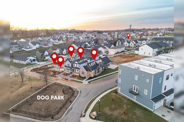 a view of a terrace with a water fall and mountain view in back