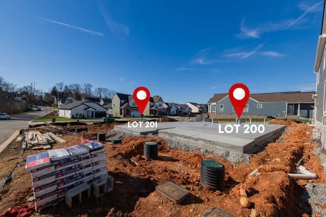 a view of a chairs and in a backyard
