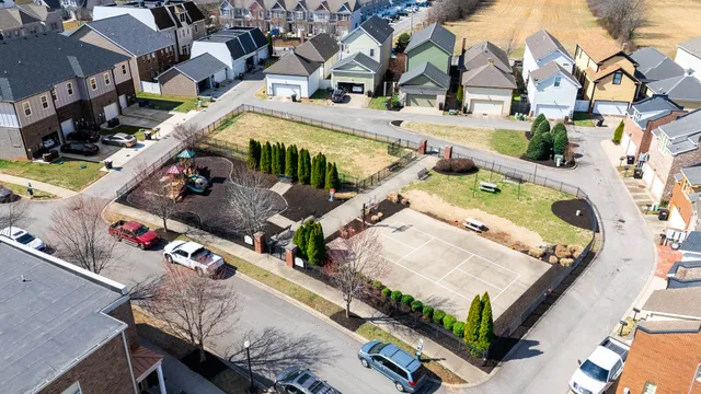 an aerial view of a house with outdoor space