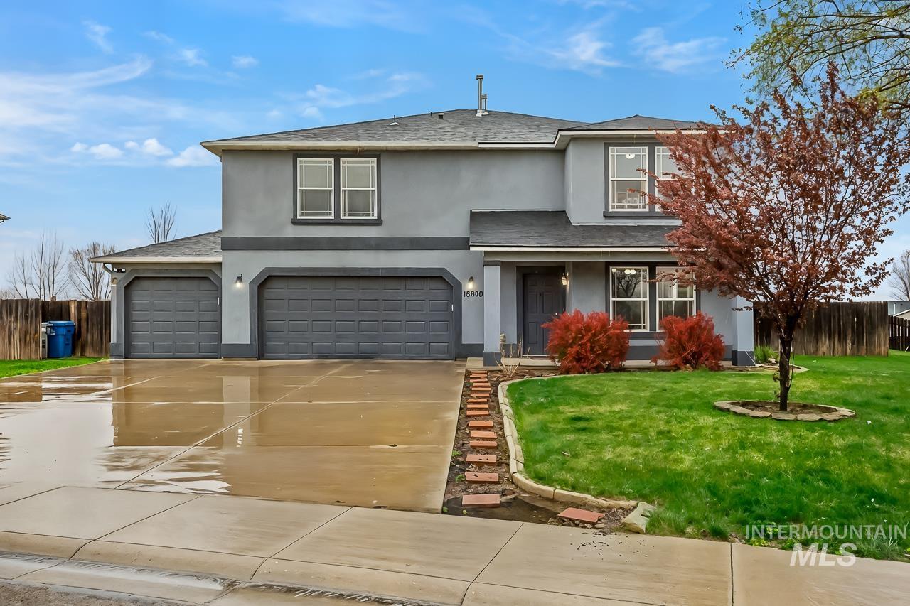 16290 Jewel Way Caldwell, ID 83607 - Photo 4 of 36 Traditional home featuring roof with shingles, stucco siding, driveway, and a garage