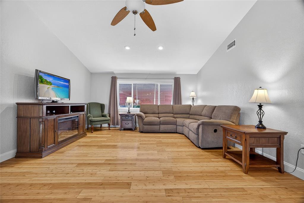 926 Genoa Court Punta Gorda, FL 33950 - Photo 14 of 41 a living room with furniture and a wooden floor