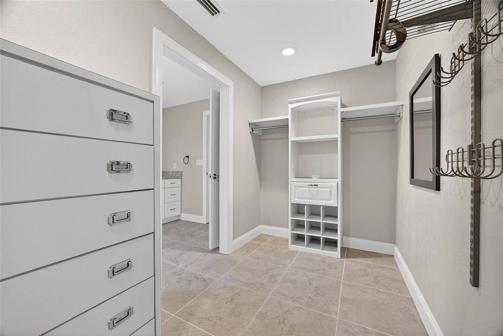 926 Genoa Court Punta Gorda, FL 33950 - Photo 18 of 41 a view of an empty walk in closet