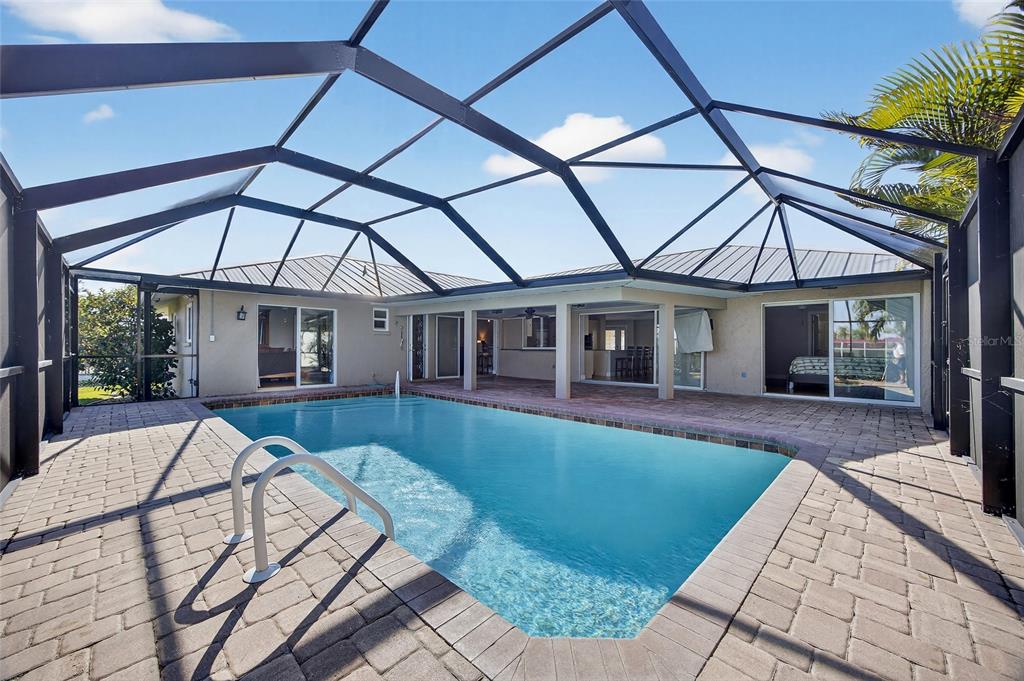 926 Genoa Court Punta Gorda, FL 33950 - Photo 26 of 41 a front view of a house with garden