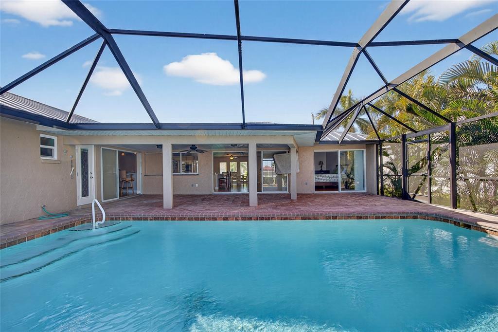 926 Genoa Court Punta Gorda, FL 33950 - Photo 28 of 41 a front view of a house with a yard