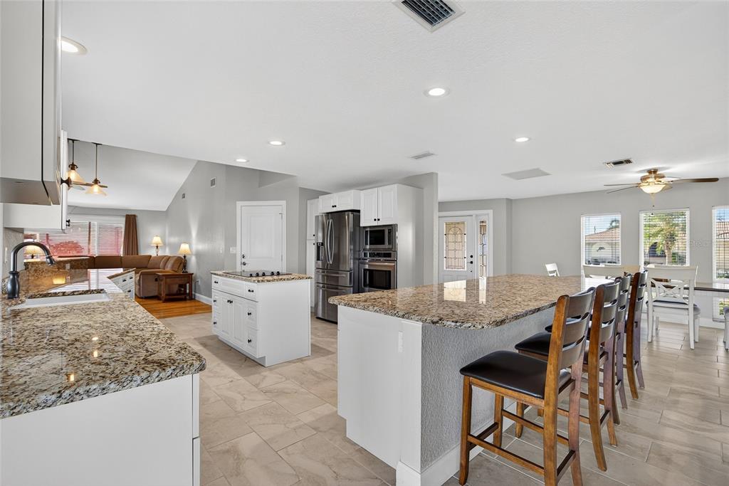 926 Genoa Court Punta Gorda, FL 33950 - Photo 6 of 41 a kitchen with appliances and cabinets