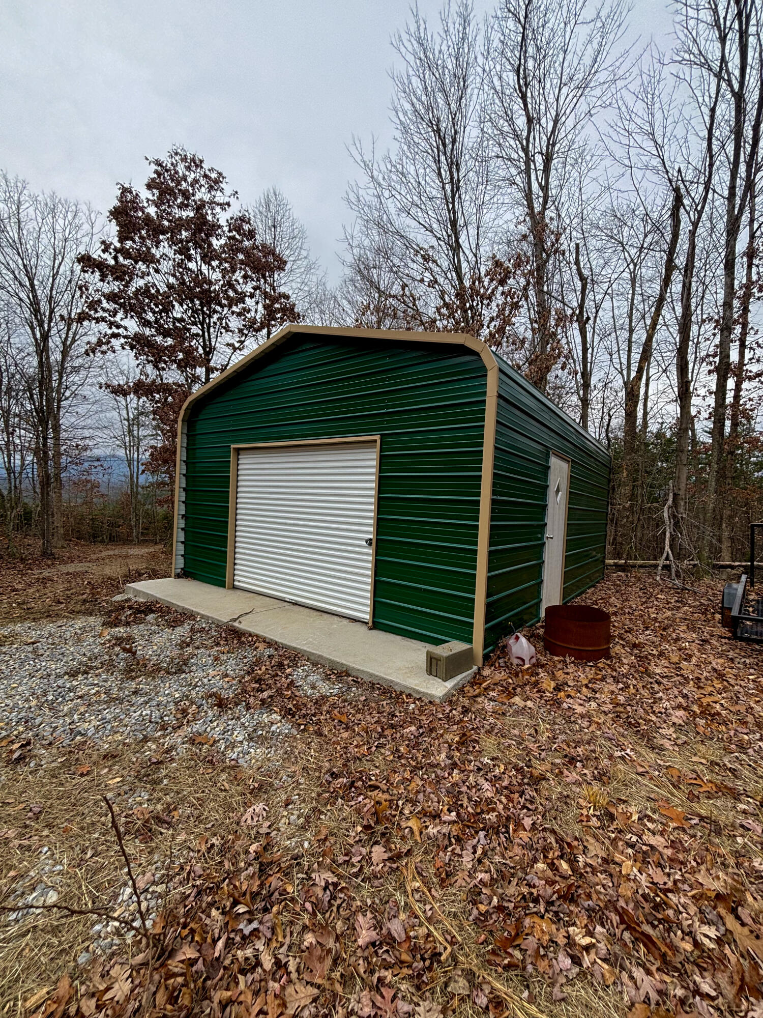7 Johnson School Road Thaxton, VA 24174 - Photo 9 of 9 a view of a house with a yard and garage
