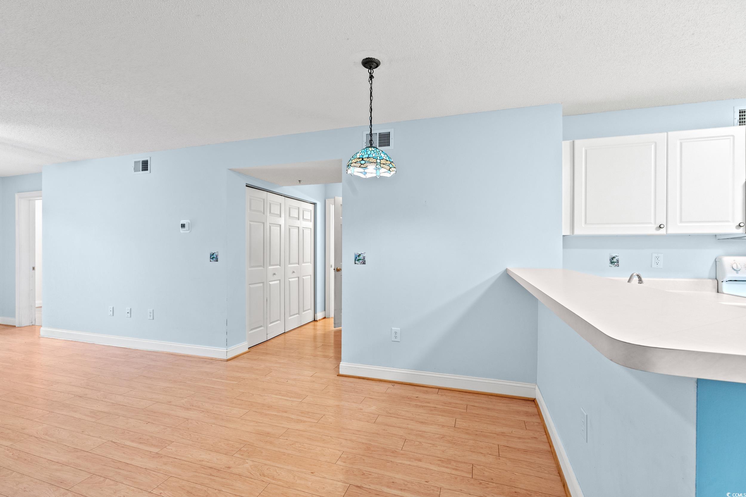 6016 Dick Pond Road, Unit 109 Myrtle Beach, SC 29588 - Photo 12 of 35 Kitchen featuring light countertops, baseboards, w
