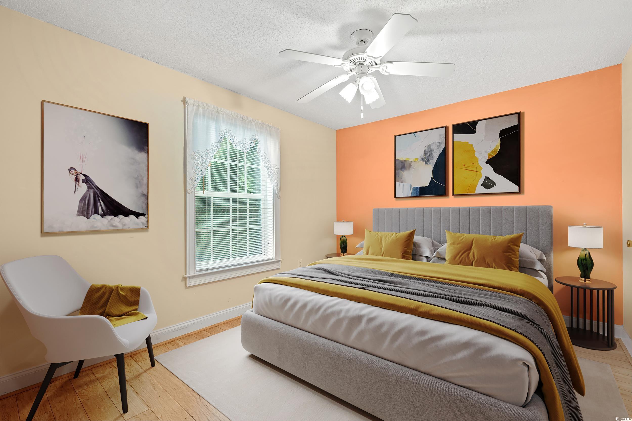 6016 Dick Pond Road, Unit 109 Myrtle Beach, SC 29588 - Photo 15 of 35 Bedroom with baseboards, wood finished floors, and