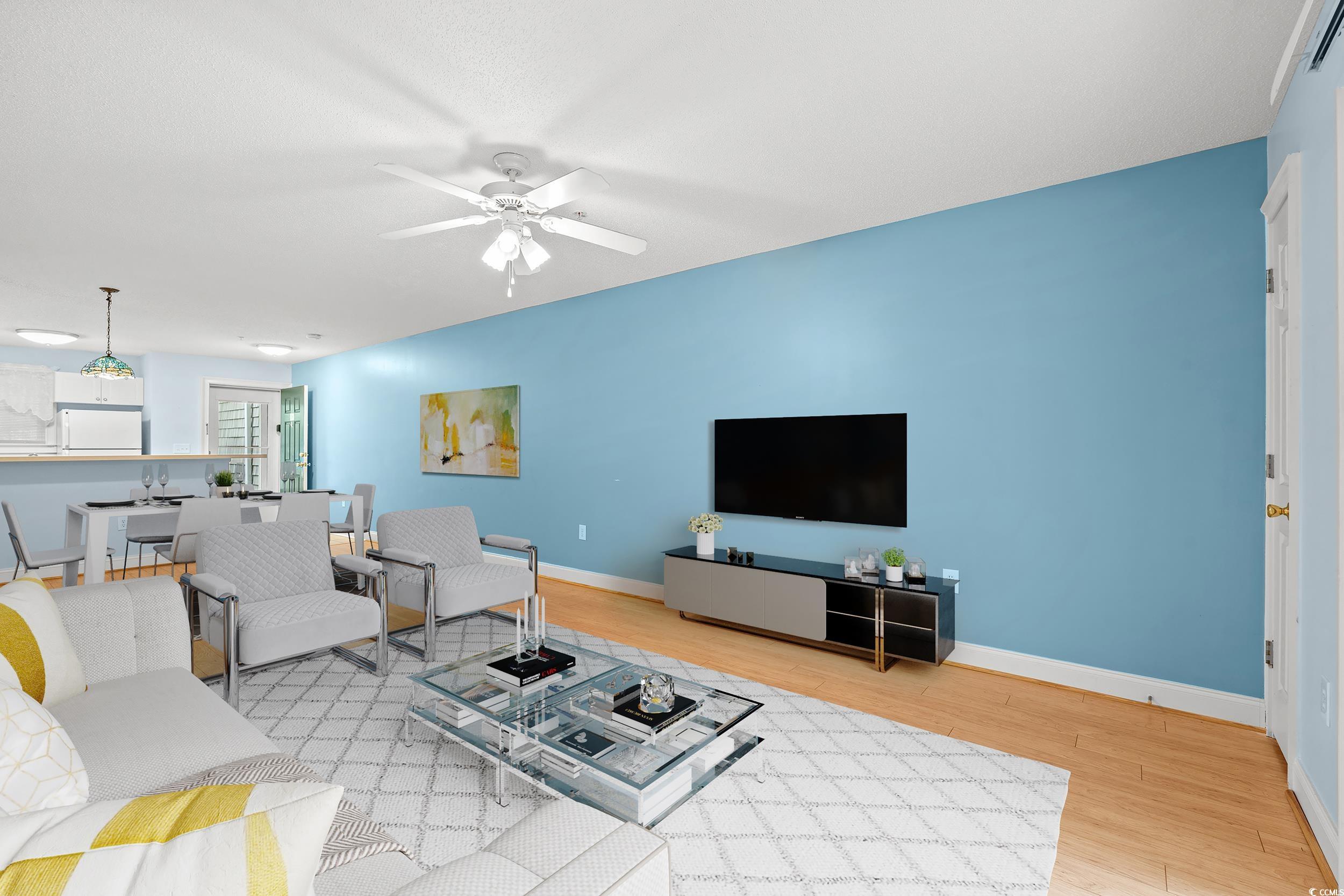 6016 Dick Pond Road, Unit 109 Myrtle Beach, SC 29588 - Photo 5 of 35 Living area with light wood-style floors, a ceilin