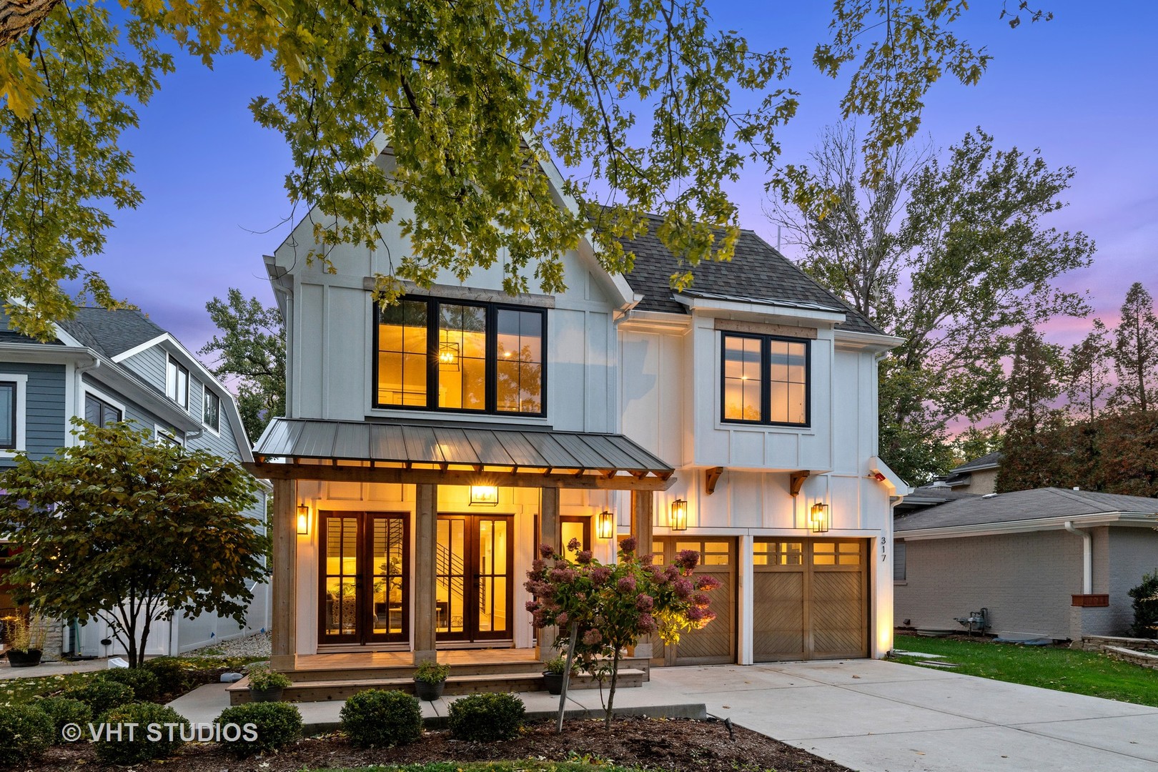 317 Lionel Road Riverside, IL 60546 - Photo 1 of 1 a front view of a house with a tree