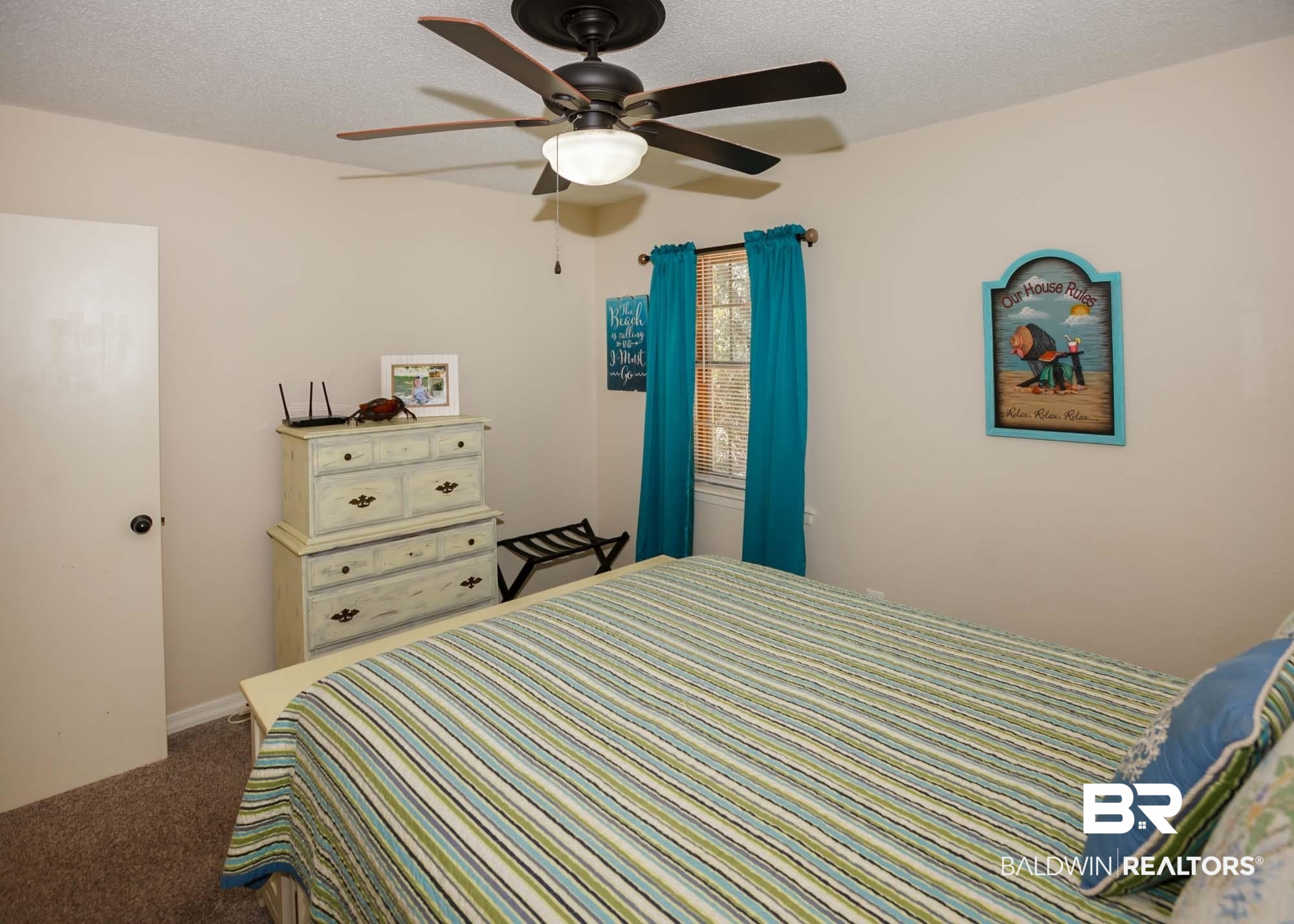 18753 County Road 12 Foley, AL 36535 - Photo 19 of 39 Carpeted bedroom featuring a textured ceiling and ceiling fan