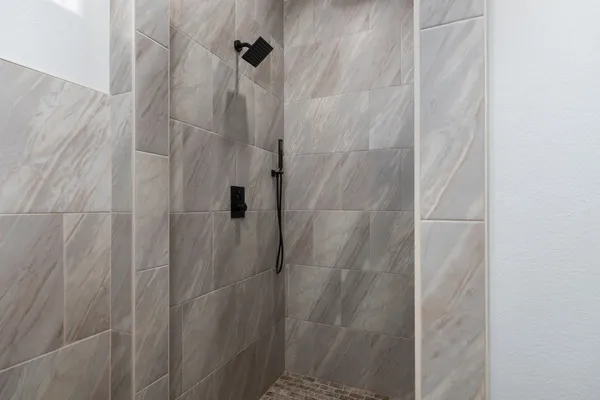 a close view of a bathroom shower