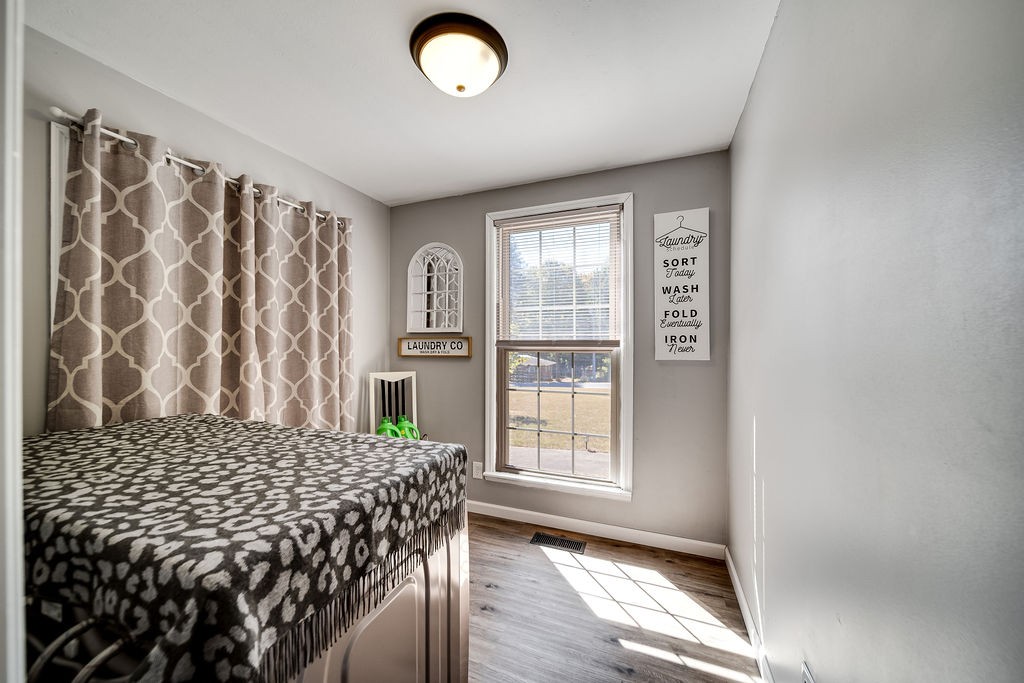 4468 Mt Zion Road Springfield, TN 37172 - Photo 16 of 48 a bedroom with a bed and a window