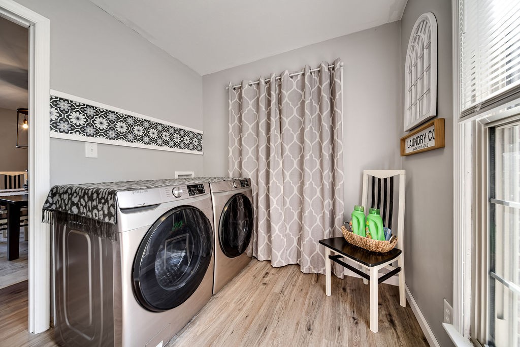 4468 Mt Zion Road Springfield, TN 37172 - Photo 17 of 48 a view of a bedroom with washer and dryer