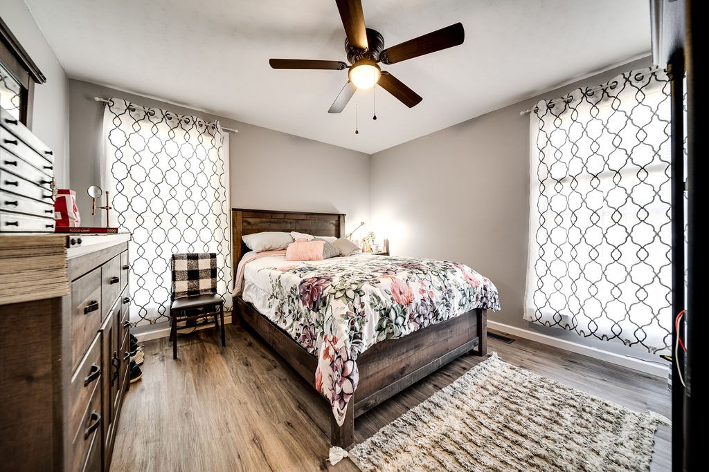 4468 Mt Zion Road Springfield, TN 37172 - Photo 28 of 48 a bedroom with a bed and a flat tv screen on dresser