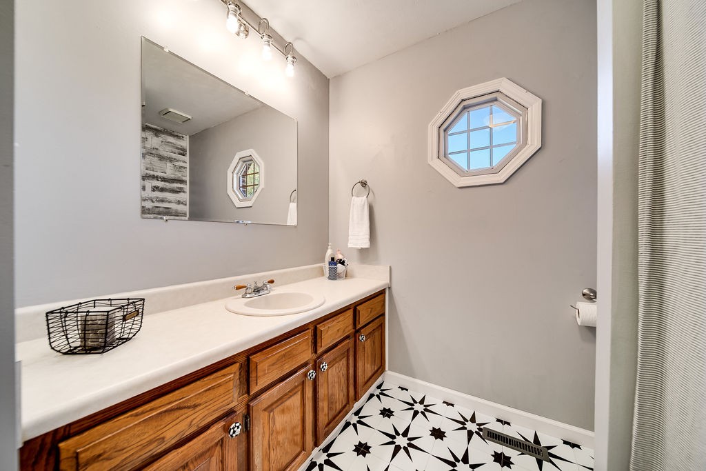 4468 Mt Zion Road Springfield, TN 37172 - Photo 30 of 48 a bathroom with a sink and a mirror