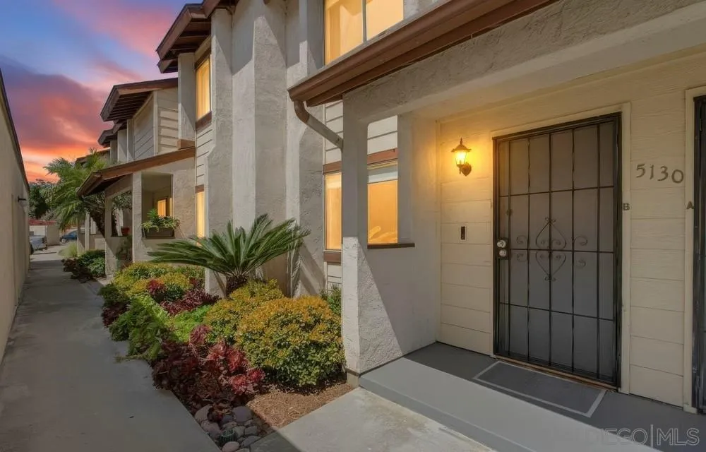 5130 North River Road, Unit B Oceanside, CA 92057 - Photo 51 of 51 a front view of a house with a yard