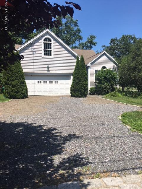 7 Shore Road Old Greenwich, CT 06870 - Photo 4 of 53 a view of house with a yard