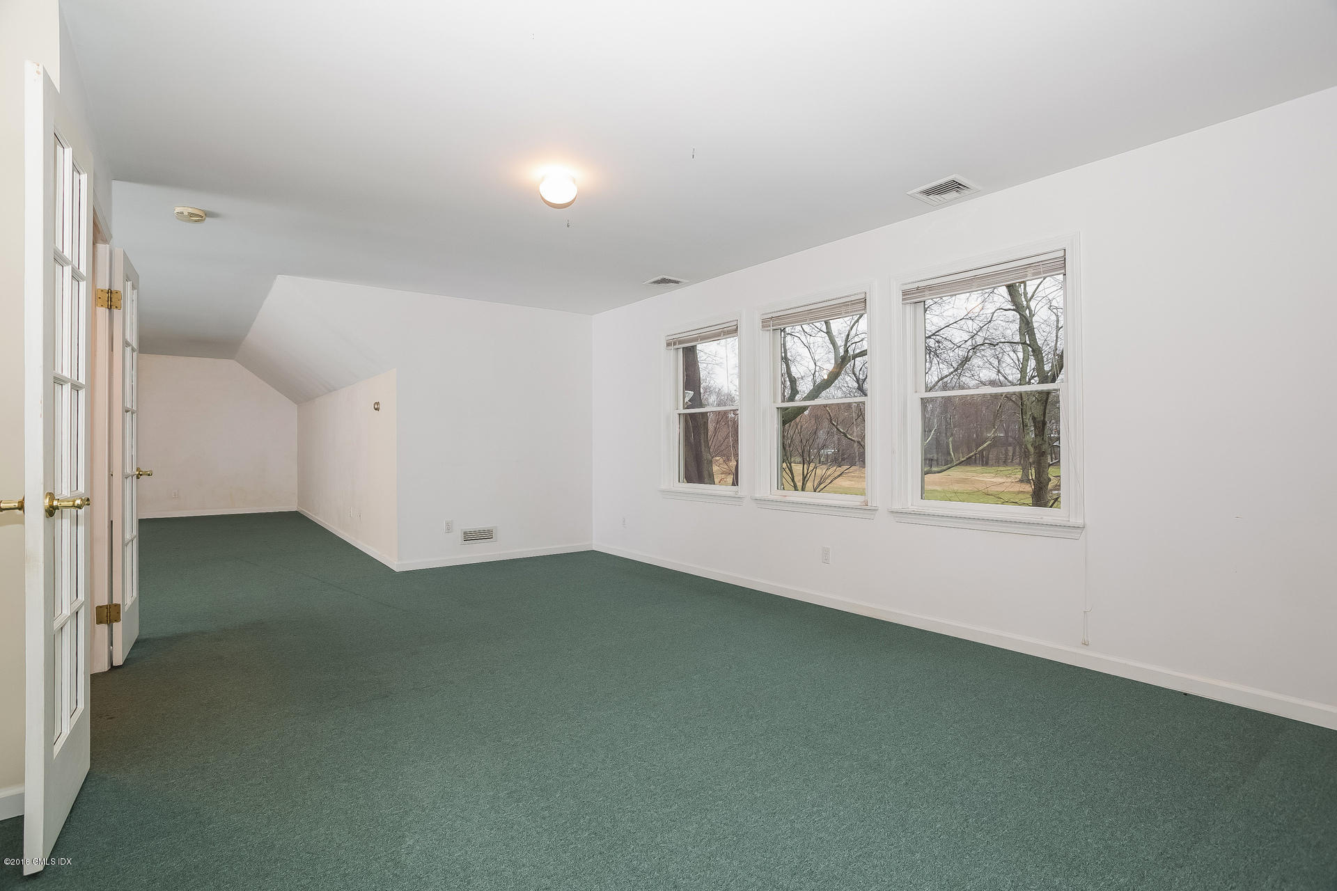 7 Shore Road Old Greenwich, CT 06870 - Photo 41 of 53 an empty room with a window