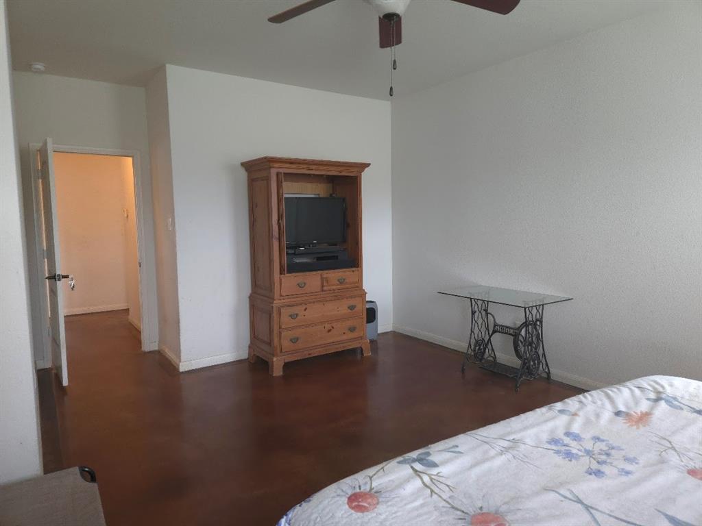 308 Kaylee Way Red Oak, TX 75154 - Photo 19 of 25 Bedroom with a ceiling fan and baseboards