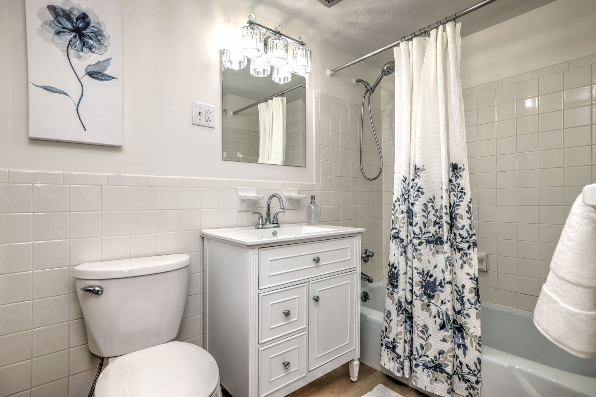 308 Meadowside Road, Unit 202 Milford, CT 06460 - Photo 13 of 40 a bathroom with a granite countertop toilet sink and mirror