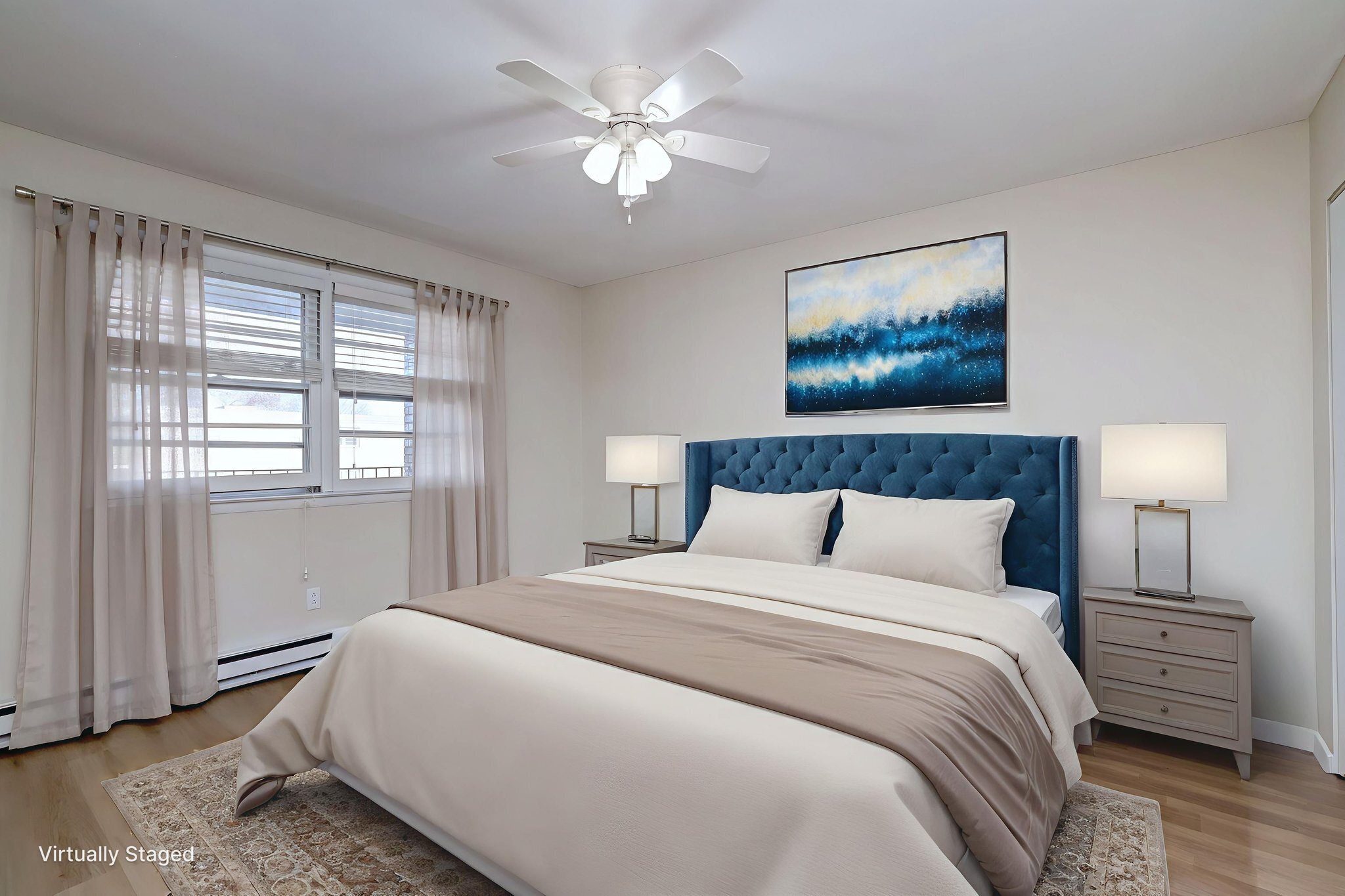 308 Meadowside Road, Unit 202 Milford, CT 06460 - Photo 14 of 40 a bedroom with a bed and a chandelier