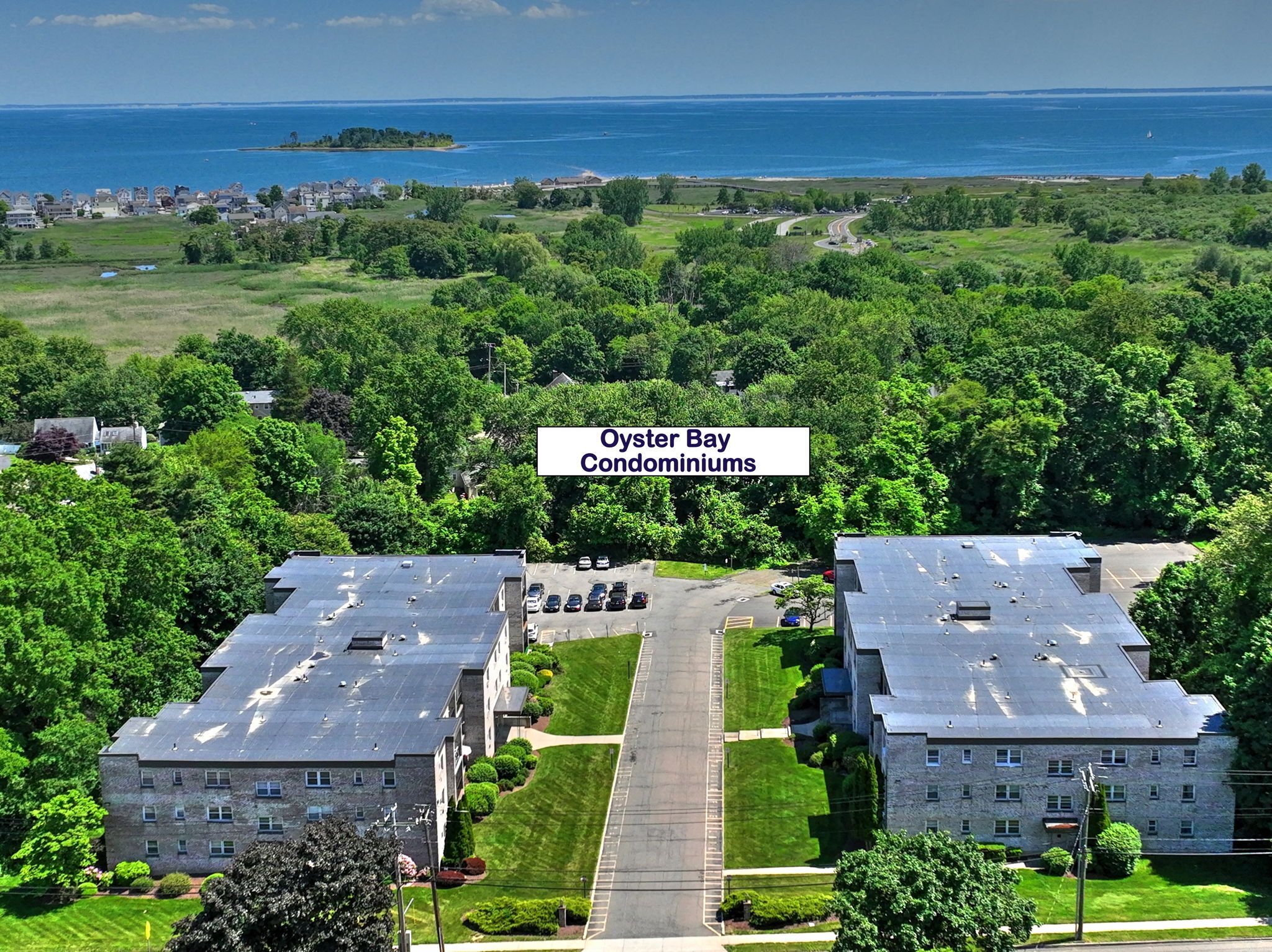 308 Meadowside Road, Unit 202 Milford, CT 06460 - Photo 2 of 40 an aerial view of a house with garden space and outdoor space