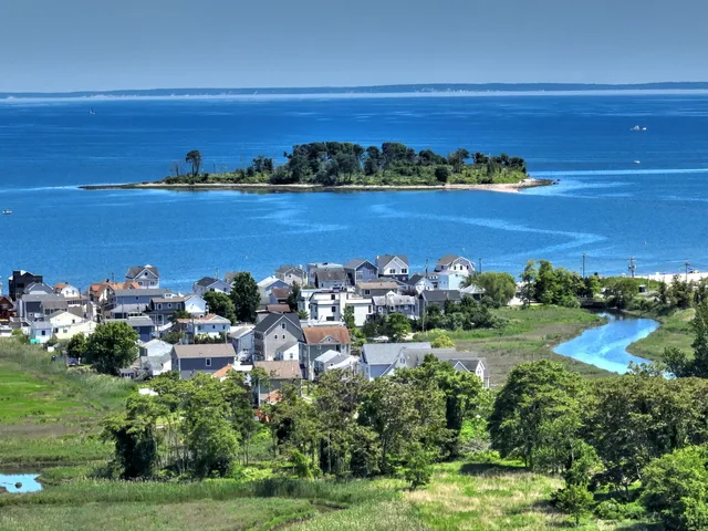 a view of a city and ocean view